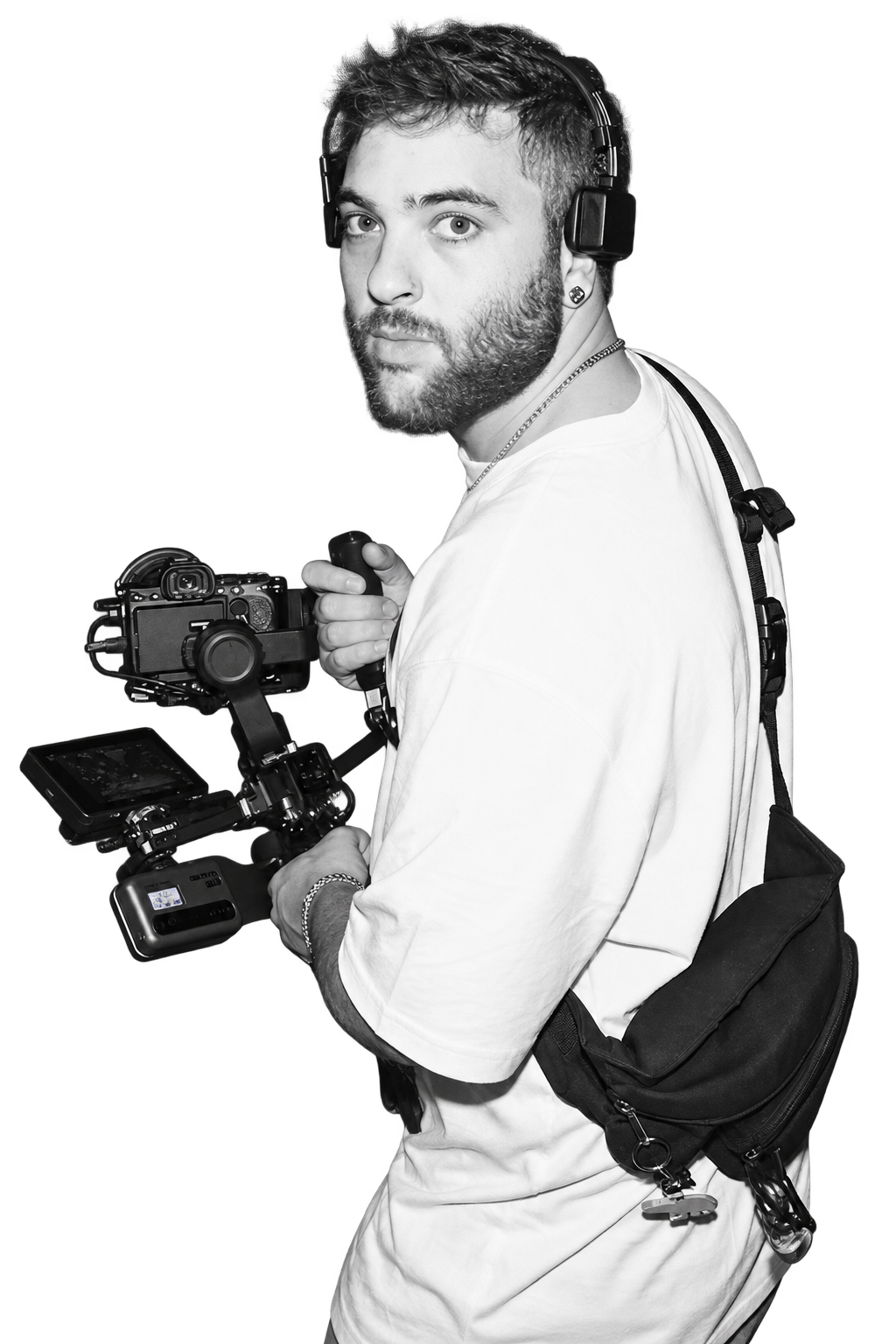 Arik Eicher, founder of TAMID, on set with his camera